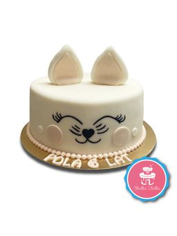 Tort słodki kotek - Torcik w kształcie kotka z zamkniętymi oczkami