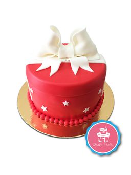 Tort prezent - Torcik w kształcie prezentu z kokardką i gwiazdkami